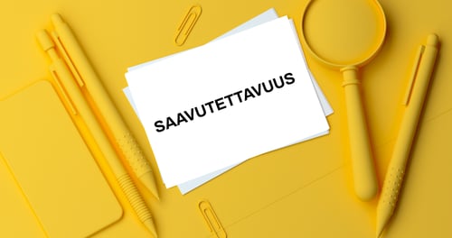 Keltaisella taustalla oleva valkoinen paperilappu, johon on kirjoitettu mustalla tekstillä sana SAAVUTETTAVUUS.